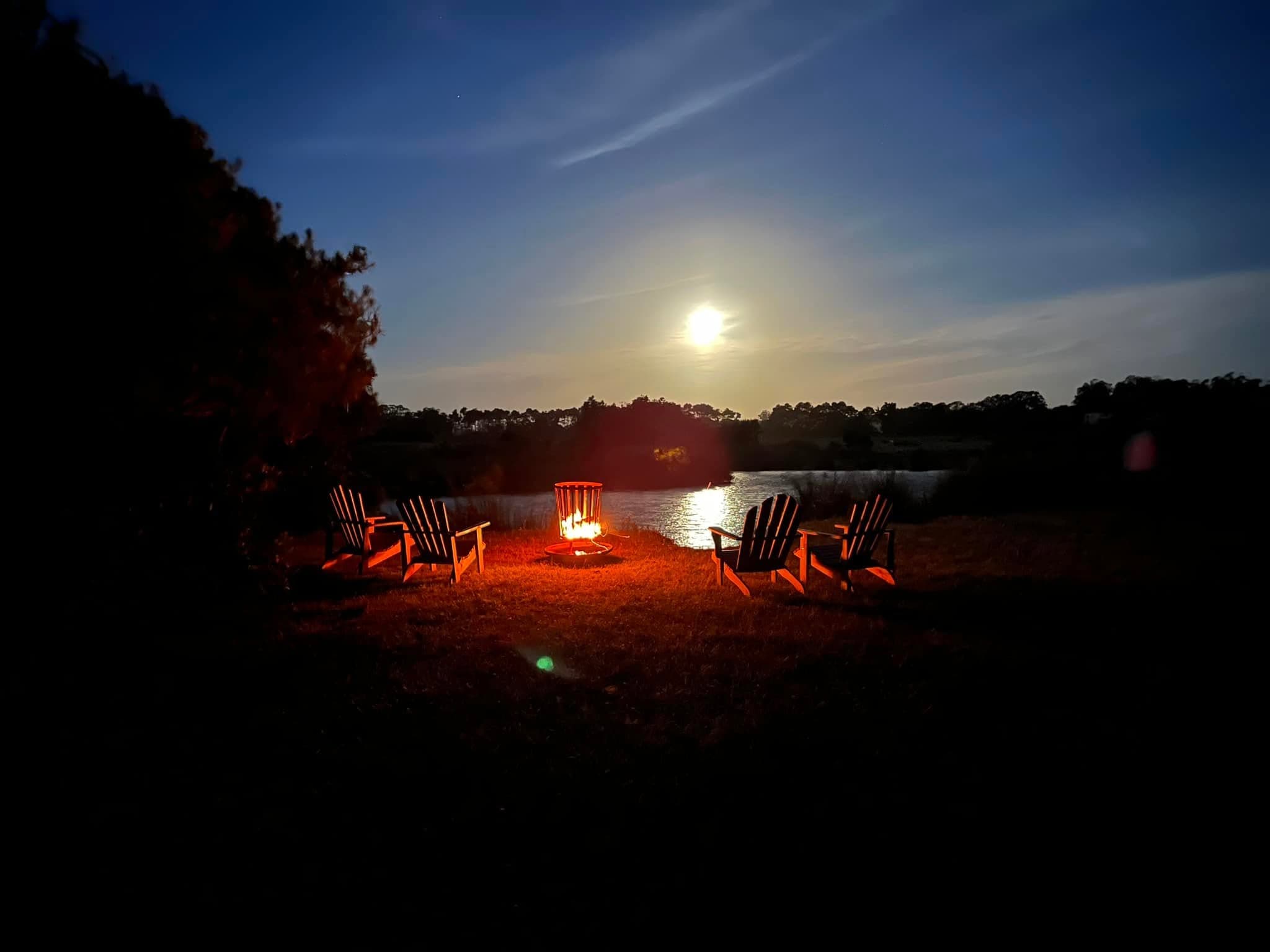 Moonlit campfire atmosphere in Uruguay.